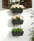 Three Tier Vertical Hanging Railing Planter Box gives your deck a fresh new look with roses and herbs in stacked planters.