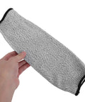 Heavy Duty Cut Resistant Arm Sleeves With Scratch Proof Armor For Gardening And Butchery Tasks Bite Resistant Guards being held in hand.