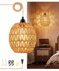 Homebody Essential Plug In Pendant Light Featuring Hand Woven Rattan And Wicker Egg Shade With 15 Ft Cord in cozy bedroom setting.