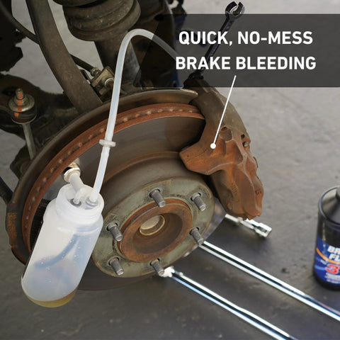 Cal-Spec Tools brake bleeder kit installed on a disc brake; white 16 oz catch bottle with clear hose