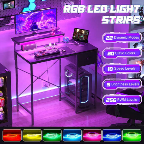 33.5 Inch Compact Gamer Desk with remote RGB LED lights featuring a monitor, keyboard, and CPU stand in home office setup