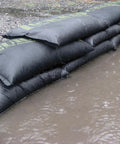 Water Activated Flood Bags 12x24 Inches 20 Pack For Fast Flood Control No Sand Needed protecting an area from floodwater
