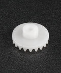 Close-up of a white plastic 20-tooth gear from the 50 Pack Plastic Gears 20 Teeth C202A Reduction Worm Gear Set for RC Cars and Robots.