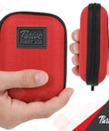 Thrive Mini First Aid Kit in red fabric shell with black zipper, front view
