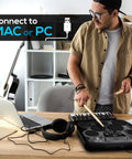 Compact Electronic Digital Drum Kit With Eight Responsive Pads And Kick Pedal Dropping Six Hundred Top Shelf Sounds Usb Midi Integration And Silent Headphone Mode For Night Owl Beat Makers in use with a laptop.
