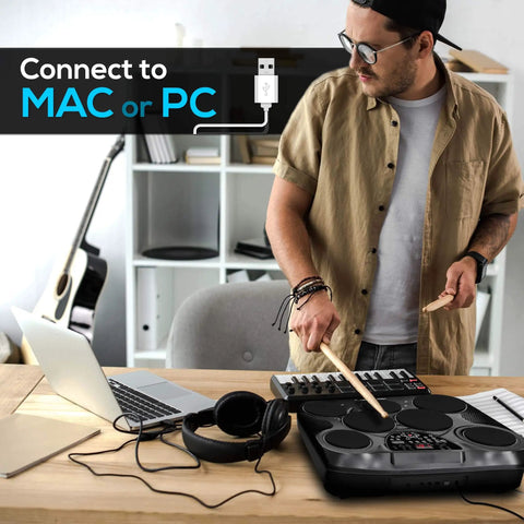 Compact Electronic Digital Drum Kit With Eight Responsive Pads And Kick Pedal Dropping Six Hundred Top Shelf Sounds Usb Midi Integration And Silent Headphone Mode For Night Owl Beat Makers in use with a laptop.