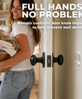 Clear Silicone Door Knob Wall Protectors 2 Inch Flat Profile Self Adhesive Bumpers, shown protecting wall from a door knob.