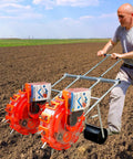 Person using adjustable dual row hand push seeder planter for corn cotton soybean peanut with 12 openings in a field