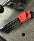 Set Of 9 Balldriver Stubby L Wrenches In 1.5 To 10 Mm, Angled Entry Up To 25 Degrees, Protanium Steel, Red Holder, On Metal Surface