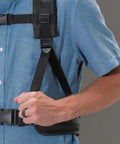 Powerhouse Lightweight Bagless Backpack Vacuum With Killer Suction harness worn by user, showcasing adjustable straps and fit.