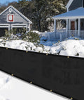 Custom Size Privacy Fence Shade Net Cover 3 Ft By 16 Ft UV Protected 170 GSM HDPE With Brass Grommets Black Bindings in a snowy yard