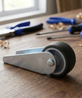5pcs Wooden Gate Wheel Side Mount Caster with 1.5 Inch Rubber Rollers, showing the caster wheel on a wooden surface.