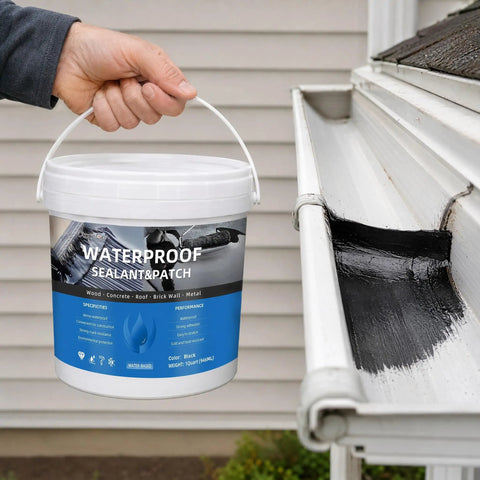Big Time Roof Saver Black Waterproof Rubber Sealant For Flat And Metal Roofs With Flexible Crack Bridge that Moves With Building Shifts and Locks Out Water Damage For Good Without Any Headaches held over a roof gutter.