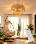 FUMLTP Boho Caged Ceiling Fans with Lights, Remote Control, Flush Mount above a cozy hanging chair in a well-lit balcony.