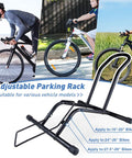 Adjustable black parking rack for bicycles, fits 16-29 inch wheels, highlighting Two Pack Bike Floor Stand For Mountain And Road Bicycles, Fits 20 To 29 Inch Wheels, 23C To 4.0 Inch Wide Tires, Indoor Outdoor Bike Rack, Easy Push On Parking For Front Or Rear Wheel, Black.