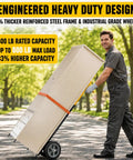 Heavy Duty Folding Hand Truck Wheeled Dolly Cart With Rugged Alloy Steel Frame Eight Hundred Lb Capacity being used to move a large box outdoors.