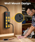 Heavy Duty Eight Outlet Power Strip With Twenty Amp Surge Protection And Six Foot Twelve Gauge Extension Cord For Workshop Garage And Kitchen Use 1960J Safety Shield wall-mounted in workshop.