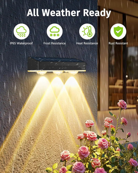 Legit Solar Fence Lights 12 Pack Dang Bright 3 LED Lens waterproof lights illuminating flowers in rain at night.