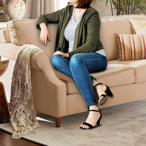 Woman sitting on sofa with 4 Inch Rubber Wood Sofa Legs Brown Replacement Feet for Couch Cabinet Futon Dresser Pack of 4 visible
