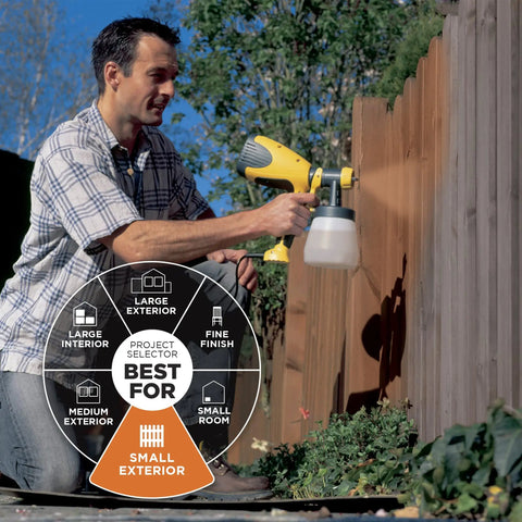 Man using Control Spray Max HVLP Paint and Stain Sprayer With Fully Adjustable Settings on wooden fence