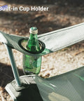Close-up of built-in cup holder on Ultralight Portable Folding Camping Chair For Adults With Cup Holder And Cooler Pouch, All Day Comfort With High Back Support, Sturdy Frame, Easy Fold, Ideal For Camping Lawn Picnics Sports And Festivals Gray Black