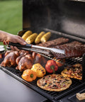 16.5 Inch Stainless Steel BBQ Tongs With Locking Mechanism Dishwasher Safe Serrated Edges For A Solid Grip lifting ribs from a grill