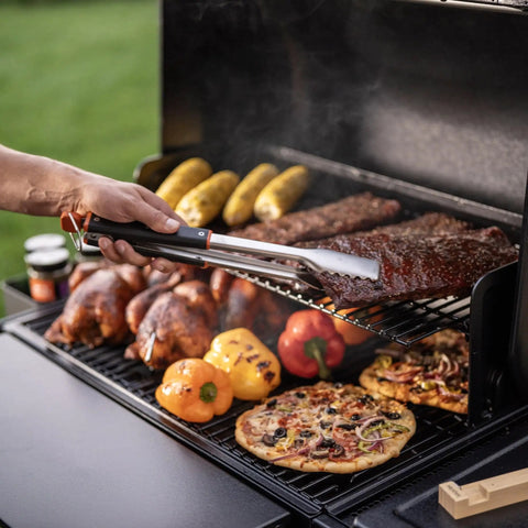 16.5 Inch Stainless Steel BBQ Tongs With Locking Mechanism Dishwasher Safe Serrated Edges For A Solid Grip lifting ribs from a grill