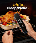 Hand using Lightning Fast Instant Read Meat Thermometer 0.3S Digital Food Thermometer to check roasted chicken in oven