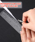 Person cutting Heavy Duty Tool Box Drawer Liner One Eighth Inch Thick 24 Inch Wide 32 Feet Long Non Slip Grippy Rubber Shelf Mat