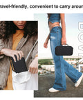 Woman carrying Rugged Carrying Case For Wingman HD GPS Speaker in black, showing portability and travel-friendly design.