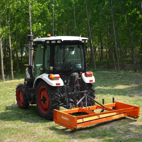 Black tractor with Heavy Duty 72 Inch Tractor Land Leveler Scraper Grader Attachment on grass field, rear view
