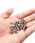 Heavy Duty Nickel Plated Chicago Screws 100 Sets M5 X 6mm Binding Screw Posts in hand, showcasing metal fasteners for leathercraft.
