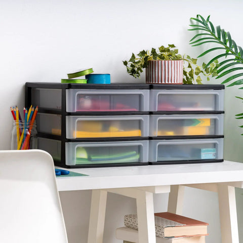 Stacking Desk Top 3 Drawer Storage Organizer, 2 Pack, for makeup, stationery, black on desk with plants, 6 clear drawers visible.