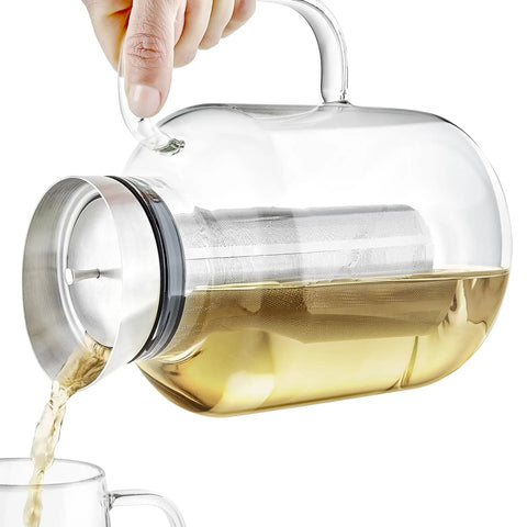 All In One Extra Large Multi Brew Borosilicate Glass Teapot Kettle And Pitcher With Tip And Pour Filter Lid in use.