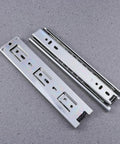 Rock Solid Steel Ball Bearing Drawer Slide Silent Telescopic Rail With Slick Glide Action Heavy Duty Cabinet Runner Pair on gray background.