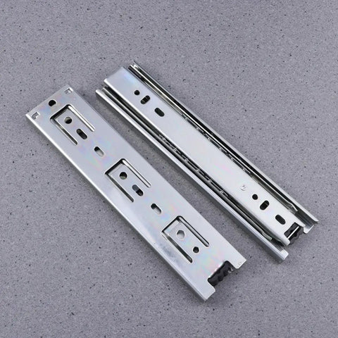 Rock Solid Steel Ball Bearing Drawer Slide Silent Telescopic Rail With Slick Glide Action Heavy Duty Cabinet Runner Pair on gray background.