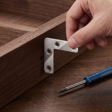 100-Piece Stainless Steel L-Shape Corner Bracket Set for 2x2 Inch Small Angle Joints installation on wooden surface