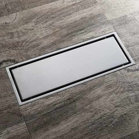 Top Shelf Game Changer 304 Stainless Steel Linear Floor Drain Rectangle Shower Tile Insert Hair Catcher Brushed Anti Odor Bathroom Grate Zero Clog Design on bathroom floor.