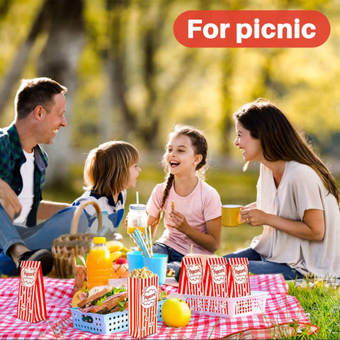Family enjoying a picnic with Flat Bottom Popcorn Bags 50 Pack With Individual Servings For Movie Night, Parties, Carnivals, And Halloween.