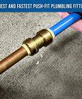 Plug And Play Three Quarter Inch To Three Quarter Inch Push Fit Straight Brass Couplings No Sweat Leak Proof Plumbing Connector Tool Free Pipe Joiner Get It Done Fast Pack Of Twenty Pieces attached to copper and blue plastic pipe.