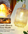 Two Pack Top Tier Amber Cylinder Pendant Lights With Vintage Ribbed Hand Blown Glass And Brushed Gold Adjustable Fixtures Serving Big Kitchen Island Or Dining Room Vibes with hand-blown glass detail.