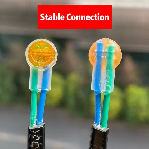Gel Filled Waterproof UY2 K2 Network Cable Connectors in close-up with telephone wire and speaker cable inserted