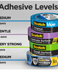 Stack of Scotch painter tapes showing adhesive levels, including Multi Surface Painter Tape Set, for indoor and outdoor painting.