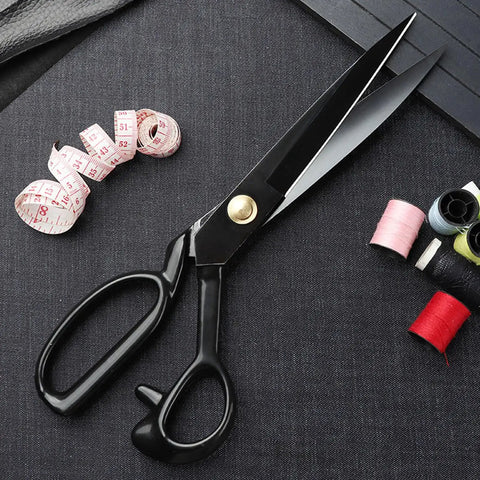 Pro Grade Ultra Sharp Fabric Scissors For Cutting Leather And Multiple Fabric Layers With 9 Inch Heavy Duty Shears Made From High Carbon Steel And Anti Rust Titanium Coating For Home Crafters Tailors Sewers And Office Projects, black angled view