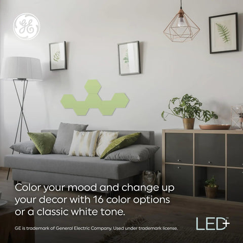 Living room with Color Changing LED Hexagon Tile Panels With Remote No App Or WiFi Needed Dorm Room Decor 6 Pack on wall.