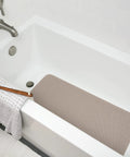Softex Bath Mat For Tubs 17 By 36 Inches Taupe Machine Washable Skid Resistant With Suction Cups And Drain Holes in white bathtub