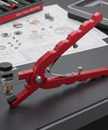 Pro Level Watch Band Tool Kit Featuring Heavy Duty Spring Bar Pliers And Precision Hole Punch for leather straps, red ergonomic design.