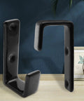 Tough As Nails 2 Pack Bunk Bed Ladder Hook Brackets Heavy Duty Black Iron J Clips displayed on a wooden surface.
