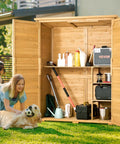 Rugged Outdoor Wood Storage Shed With Waterproof Roof And Metal Frame, Double Lock Doors And Shelves, open in backyard