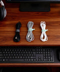 Silicone Cable Ties Reusable Set Of 28 For Charging Cables And Computer Wires In Four Color Options, Flexible 4.2 Inch Adjustable Cord Organizer Straps for tidy desk cable management.
